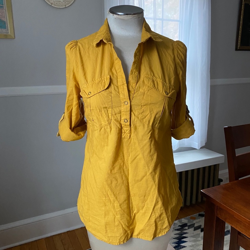 Mustard-colored pullover top